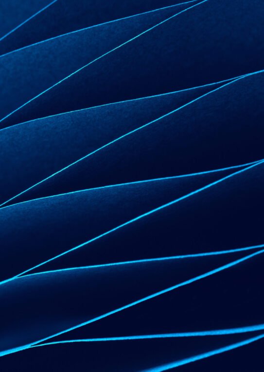 Blue abstract festive background, fragment of paper Christmas decoration close-up